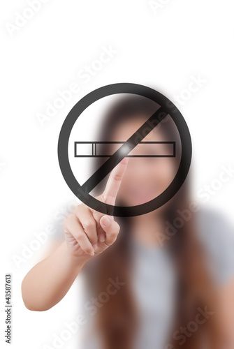 Photo: Business lady pushing stop smoke on the whiteboard. Business lady pushing stop smoke on the whiteboard.