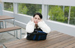 Outdoor portrait of a sad woman looking thoughtful about trouble