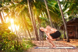 Man with dreadlocks doing yoga
