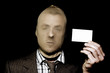 Dodgy salesman with business card