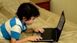 Video: Young Boy Playing on a Laptop Young Boy Playing on a Laptop
