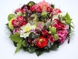 Blumengesteck mit Teelicht