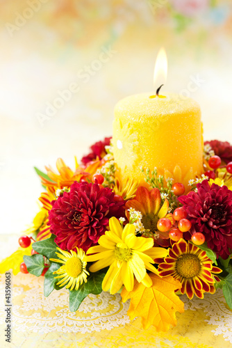 Photo: wreath of autumn flowers and candle wreath of autumn flowers and candle