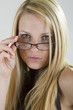 Looking over her glasses