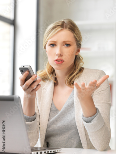 Photo: businesswoman with cell phone businesswoman with cell phone