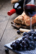 Red wine and grapes