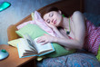 The girl fell asleep with a book