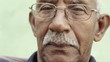 Video: Portrait of sad old black man with glasses and mustache Portrait of sad old black man with glasses and mustache