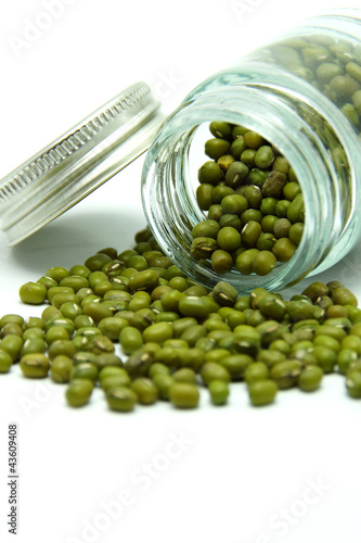 Photo: Organic Food; Green Mung Bean in Bottle on White Background Organic Food; Green Mung Bean in Bottle on White Background