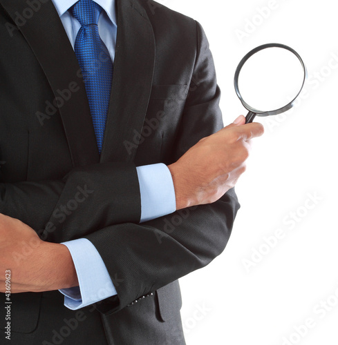 Foto: businessman with magnifying glass businessman with magnifying glass