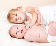 Toddler girl with newborn baby
