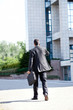 Photo: Business man leaving after a working day Business man leaving after a working day