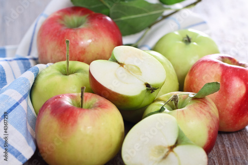 Photo: Red and green apples with leaves Red and green apples with leaves