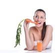 Foto: Woman with the carrots juice Woman with the carrots juice