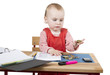 Foto: young child at writing desk young child at writing desk