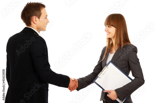 Photo: A business handshake, isolated on white background A business handshake, isolated on white background