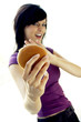 A lady refraining herself from eating a cheese burger