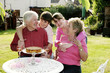 Foto: A girl and boy giving their grandparents a surprise visit A girl and boy giving their grandparents a surprise visit