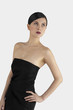 Studio shot of a lady in black dinner dress