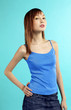 Studio shot of a lady in blue spaghetti straps top and mini skirt