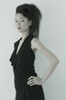 Black and white picture of a lady in black dress
