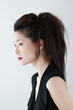 Side shot of a lady in black dress
