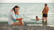 Young Family on a Summer Beach