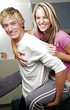 Man carrying his girlfriend on his back