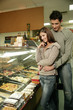 A couple shopping for food