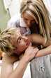 A couple cuddling on the bed