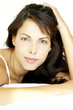 Close-up picture of a woman looking at the camera 