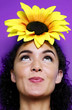 Woman with a sunflower on top of her head