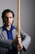 Businessman holding a kendo
