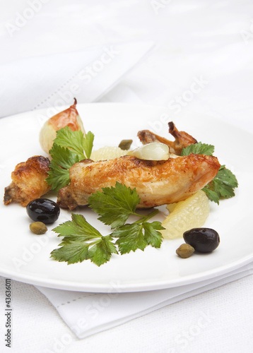 Photo: A chicken meal on a plate A chicken meal on a plate