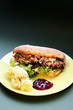 Meat salad sandwich with mashed potatoes and cranberry sauce