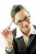Businesswoman holding a pen, thinking