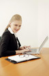 Businesswoman working on her laptop