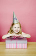 Girl unwrapping her present