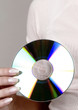 Woman holding a compact disc