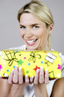 Woman smiling while holding a present