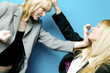 Businesswomen fighting