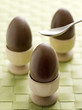 Chocolate eggs in egg cups