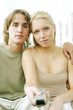 Photo: Couple watching television together Couple watching television together