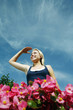 Teenage girl shielding her face