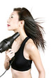 Woman blow-drying her hair