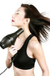 Woman blow-drying her hair