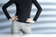 Businesswoman with her arms akimbo
