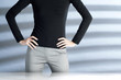 Businesswoman with her arms akimbo