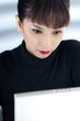 Businesswoman using laptop