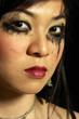 Photo: Woman with smudged mascara around her eyes Woman with smudged mascara around her eyes